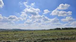 Zon en wolken