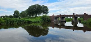 Opklaringen en weerspiegeling in het water vanmiddag 