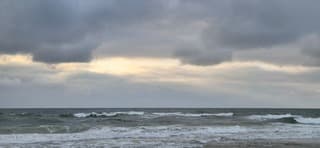 Weersverandering opkomst boven zee Scheveningen 
