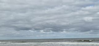 Prachtige wolkenlucht boven zee Kijkduin 