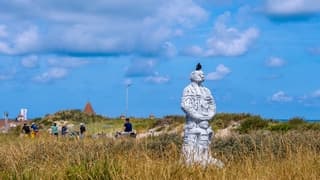 BEWOLKING BOVEN ZEE