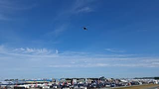 Helikopter boven het zonovergoten TT circuit - Assen