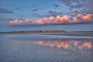 Spiegelende wolkenluchten 