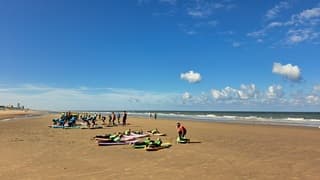 Surflessen bij zee 
