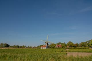Zon en wat sluiers