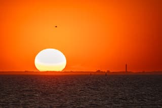 zonsondergang boven ameland 25-08-2026