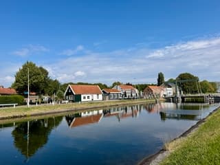 Zon/wolken/weerspiegeling