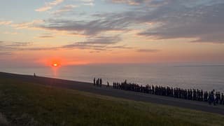 Ondergaande zon met mariniers 