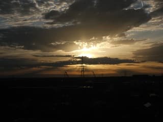 Ochtendzon achter de wolken