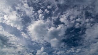 SCHAPENWOLKJES BOVEN ZEE