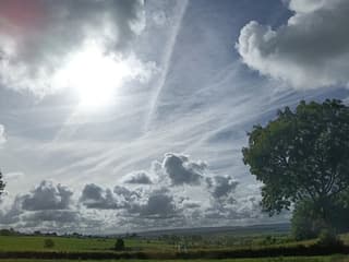 zon/ wolken