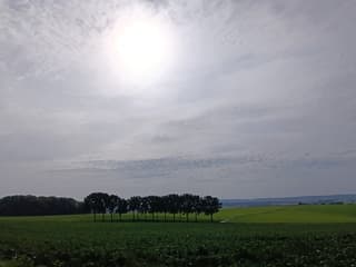 zon/wolken