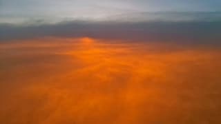 Zonsondergang vanuit de lucht
