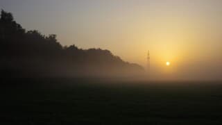 Zonsopgang en ochtendmist 