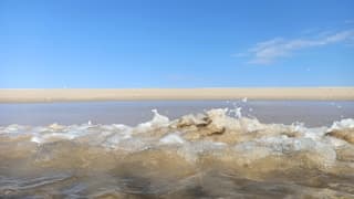 Strand zon oceaan 28 graden