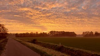 Zonsopgang met wolkjes