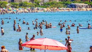 Zinderende hitte, verkoeling in de zee