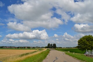 Zon en wolken.