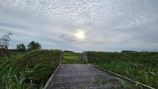 Heel even was de zon goed te zien met alle bewolking in de buurt