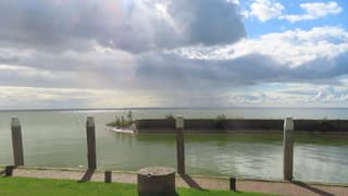 Bewolking en zon vanmiddag