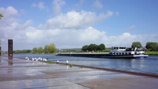 Zon, opklaringen en prachtige wolkenluchten bij Cuijk in de middag 
