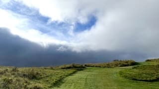 Bijzondere lichtval tussen de wolken door