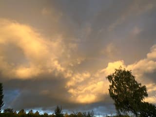 Gouden uurtje met regenboog 