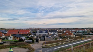 Sluierwolken en opklaringen boven Callantsoog 