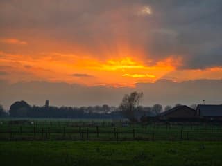 Zonsondergang in Oijen, Brabant