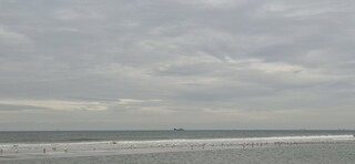 Mooie wolkenlucht boven zee Scheveningen 