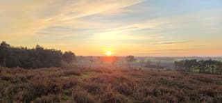 Prachtige zonsondergang gezien vanaf de Lemelerberg 