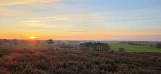 Prachtige zonsondergang gezien vanaf de Lemelerberg 