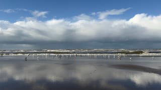   Regen boog flinke buien aan zee 
