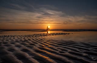 zon ondergang op strand