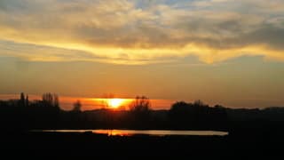 Zonsondergang boven Lentevreugd