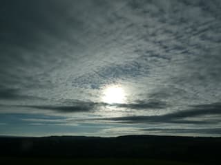 zon/wolken/ tegenlicht