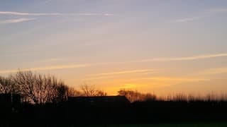 Zonsondergang met een heldere winterlucht 