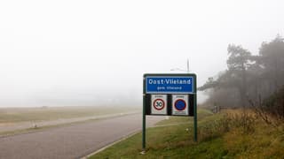 Veerdienst opnzichtbaar in de mist