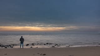Bewolkt en toch ook kleurrijke lucht op Vlieland