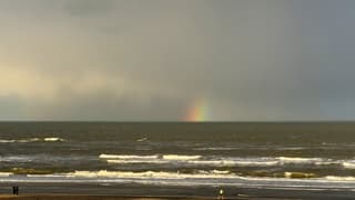 regenboog  op zee