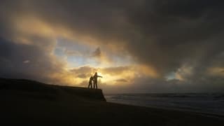 Zandafslag door stormachtige zee