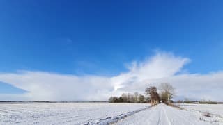 Dikke sneeuwbui in de verte!