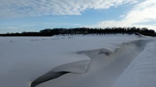Kunstwerk van stuifsneeuw
