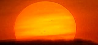 Zonsondergang ingezoomd met telefoon