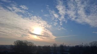  bewolking trok weg maar het bleef heiig