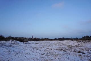 Sneeuw in laatste zonlicht 