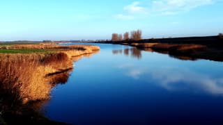 zon blauwe lucht sluier 