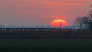 Zonsondergang vanuit Britsum. 