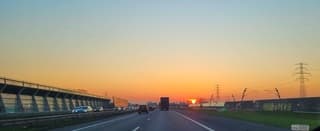 Zonsondergang op de A15 