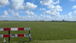 Zon, schitterende wolkenluchten in het polderlandschap bij Amersfoort